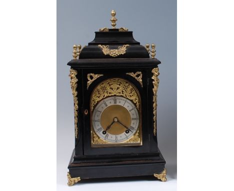 A Victorian ebonised cased bracket clock, in the mid-18th century style, having unsigned arch brass dial with matted centre, 