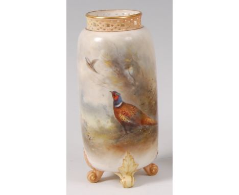 A Royal Worcester porcelain vase, of cylindrical form with pierced neck, enamel decorated with a cock pheasant and flying hen