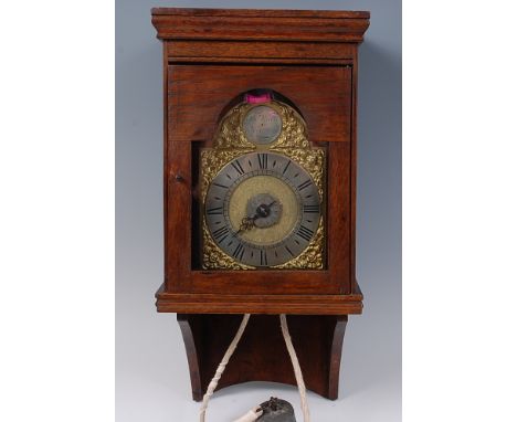 Thomas Watts of Lavenham - an 18th century brass wall clock, having an arched dial with signed silvered disc to the arch, sil