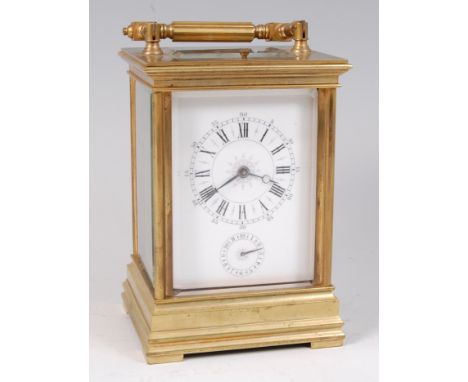 A circa 1900 French brass carriage clock, with alarm and push button hour repeat, having visible platform escapement, unsigne