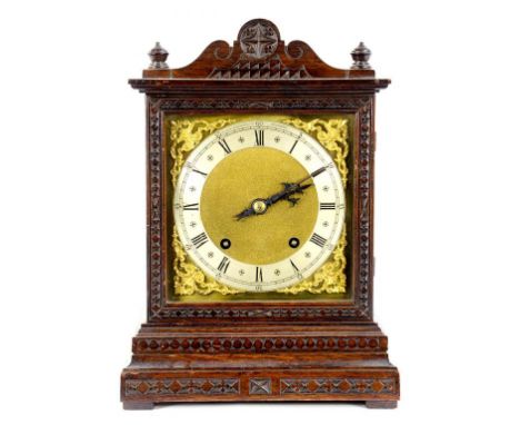 A GERMAN OAK MANTLE CLOCK WITH BRASS DIAL AND WINTERHALDER AND HOFMEIER MOVEMENT, 32CM H, CIRCA 1900