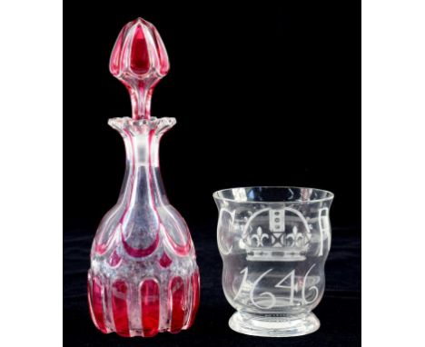AN ENGRAVED GLASS BEAKER WITH CROWN, INITIALS CR AND DATE 1646, 9CM H, ENGRAVED RD 75175 AND A CRANBERRY FLASHED  AND CUT GLA