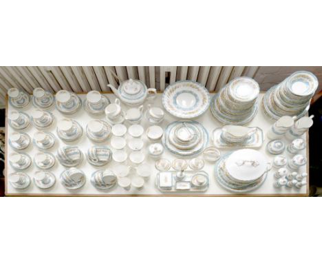 AN EXTENSIVE CROWN STAFFORDSHIRE DINNER SERVICE AND TRINKET WARE
