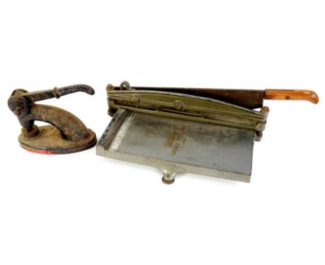A BLACK JAPANNED IRON LETTER EMBOSSER AND A BENCH GUILLOTINE