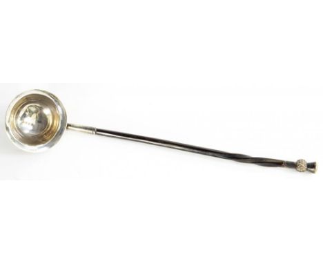 A VICTORIAN SILVER TODDY LADLE WITH TWISTED BALEEN HANDLE AND THISTLE TOP, LONDON 1846