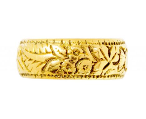 A VICTORIAN 18CT GOLD FOLIATE ENGRAVED WEDDING RING, BIRMINGHAM 1894, 4.4G, SIZE K