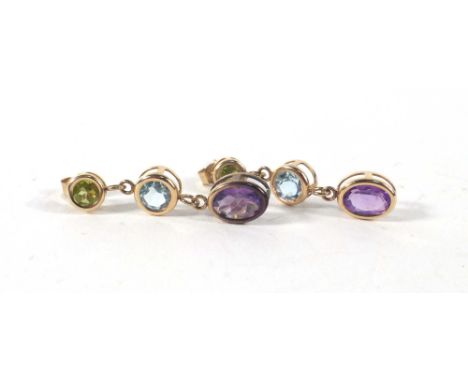 A pair of 9ct yellow gold ear pendants each set a graduated peridot, topaz and amethyst in rubover settings, overall 1.6 gms