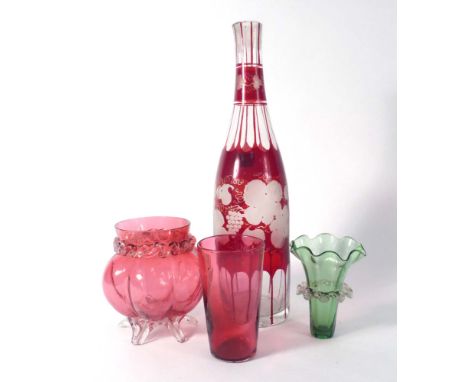 A Bohemian ruby and clear glass decanter, h. 29 cm, a novelty amber glass decanter and stopper in the form of an eagle and a 