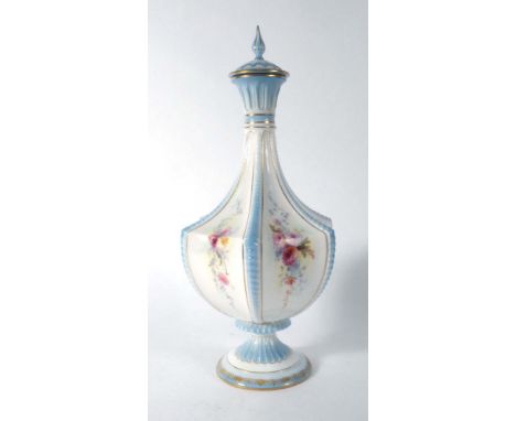 A Royal Worcester decanter and stopper of slender hexagonal form, the panels each decorated with a floral spray on a white gr