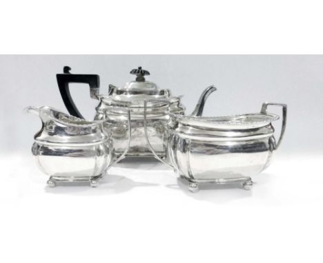 A silver three piece tea service of vase shaped form, maker SWS & Co., Birmingham 1903, overall 21 ozs CONDITION REPORT: Typi