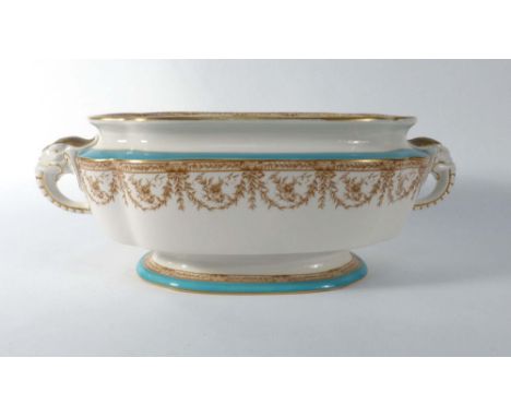 A Royal Worcester tureen of oval form having a pair of elephant head handles and decorated in the neo-classical manner on a w