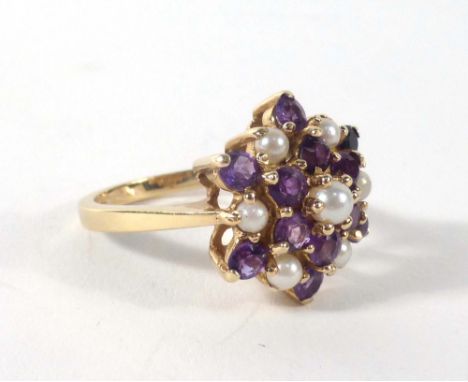 A 9ct yellow gold cluster ring set amethyst and seed pearls,ring size P,4.8 gms