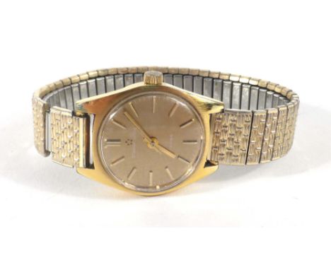 A gold plated ladies Eterna-Matic 'Sahida' wristwatch, the circular dial with gold coloured baton numerals on an expanding br