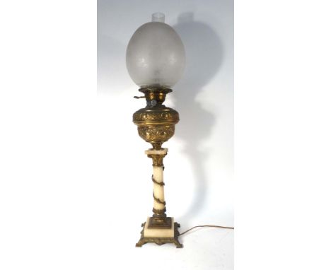 A late 19th century alabaster, brass and gilt metal mounted oil lamp, converted, with an etched glass shade, h. 77 cm