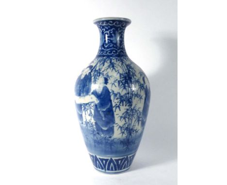 A Chinese blue and white vase of baluster form decorated with figures holding a scroll amongst bamboo, h. 39 cm (af) CONDITIO