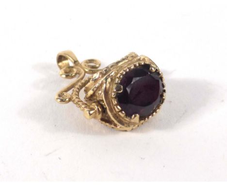 A 9ct yellow gold swivel fob set amethyst, citrine and garnet, overall 4.9 gms