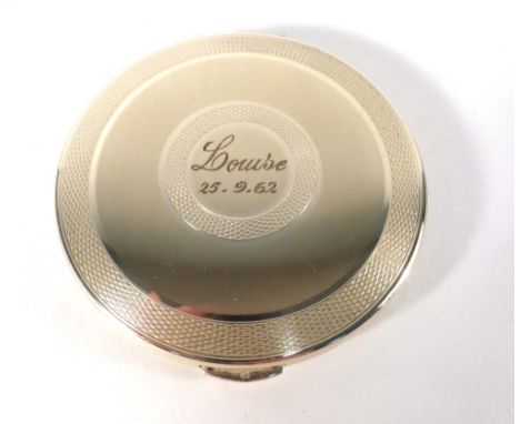 A mid-20th century silver and engine turned compact of circular form, London hallmarks rubbed, d. 7.5 cm CONDITION REPORT: Wi