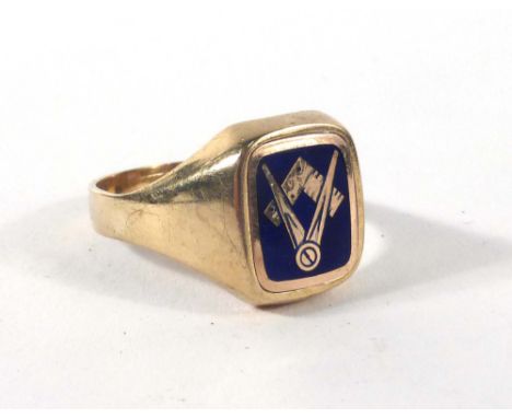A yellow metal signet ring decorated in blue enamel with a Masonic set square and compass,ring size W,5 gms   CONDITION REPOR
