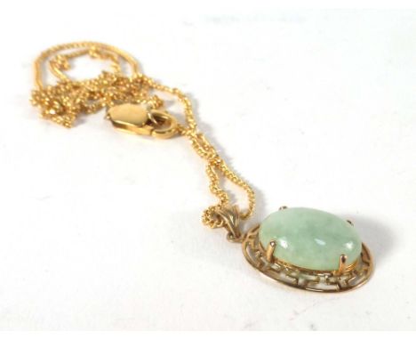 A 9ct yellow gold flat curblink necklace with lobster clasp suspending an oval pendant set pale green jade, overall 5.8 gms