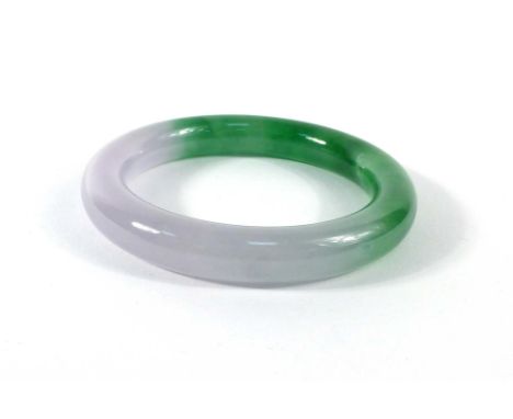 A green/white jade bangle, internal d. 5.7 cm