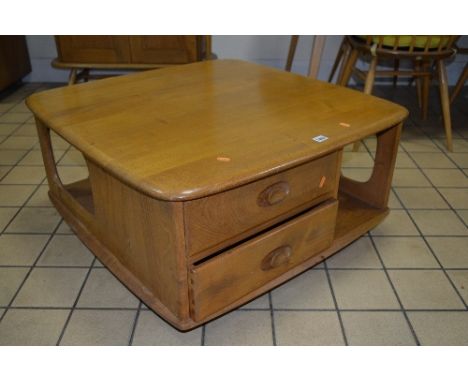 AN ERCOL WINDSOR PANDORA'S BOX LIGHT ELM SQUARE COFFEE TABLE, with two drawers and storage