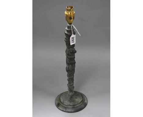 A CAST BRONZE LAMP BASE, in the form of figure, height approximately 34cm (not including fitting)