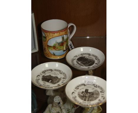 A ROYAL WORCESTER COMMEMORATIVE MUG, Limited edition of 2000, together with three Royal Worcester pin trays 'Worcester Cathed
