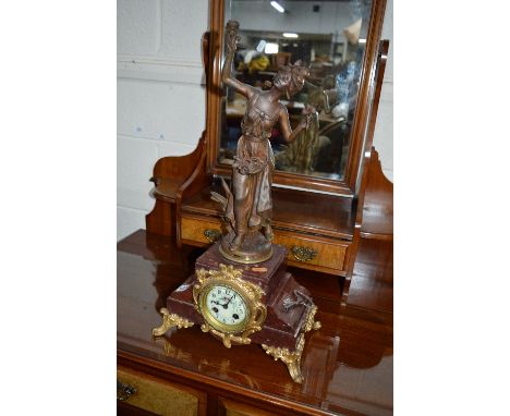 A FRENCH MARBLE MANTLE CLOCK, surmounted by a lady figure, enamelled dial, signed Marchande de Fleurs, par earlier, sculpt (w