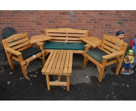 A TREATED PINE BENCH, two chairs, coffee table and two corner shelves to join seating together with removable cushions (6)
