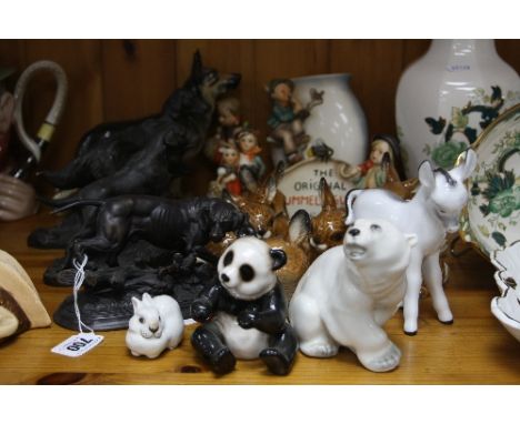 A GROUP OF FIGURAL ORNAMENTS, including USSR, Hummel, Goebel rabbits, bronzed dog figures, etc (s.d) (17)