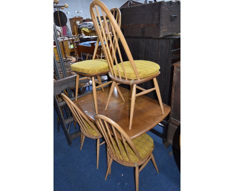 AN ERCOL DROP LEAF TABLE, and four spindle back chairs with removable cushions (5)