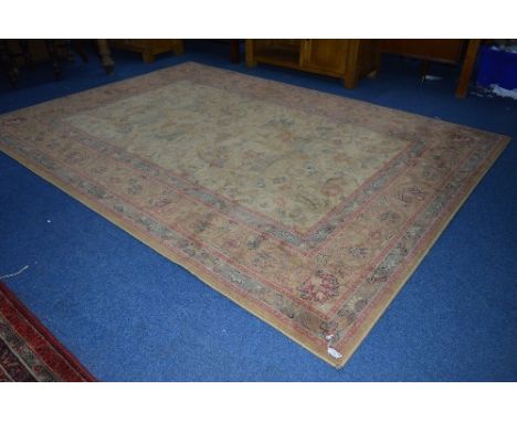 A CARAMEL GROUND HAND MADE CARPET, 100% wool 'Royal Kesham Sennah' label attached, approximate size 240cm x 170cm