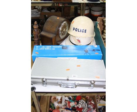 A CASED SET OF BARBEQUE TOOLS, a boxed Japanese telescope, a Police helmet, a Hampshire Fire & Rescue helmet and a mantel clo