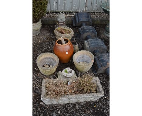 A GARDEN ORNAMENT IN WINDMILL FORM, three urns, one oblong planter and a glazed planter, etc (8)