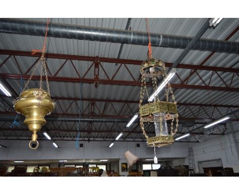 A BRASS HANGING LIGHT, Gothic detail with central glass and two other metal hanging items (3)