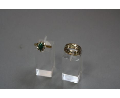 TWO LATE 20TH CENTURY CUBIC ZIRCONIA RINGS, to include an oval green stone and cubic zirconia oval cluster ring, ring size L,