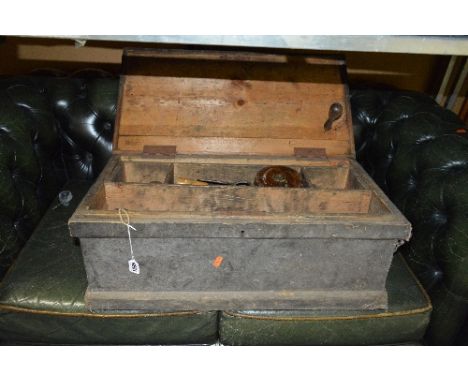 A VINTAGE PINE TOOL BOX, with inner tray and contents including tape measures, saws, chisels