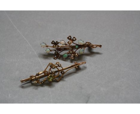 AN EARLY 20TH CENTURY OPAL, RUBY AND SEED PEARL SPRAY BROOCH, measuring approximately 50mm  in length, pin and hook catch, st