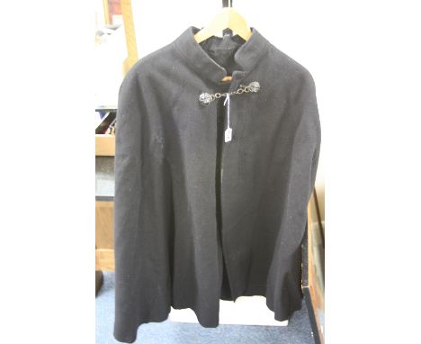 A BLACK 'POLICE' CAPE