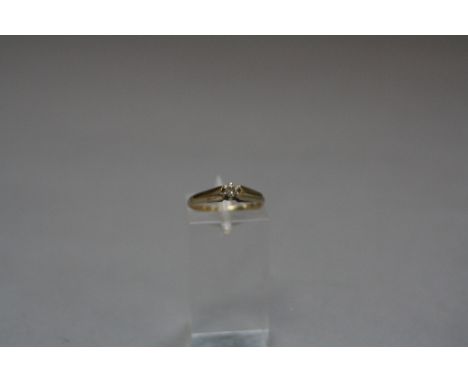 A LATE 20TH CENTURY 9CT GOLD DIAMOND SINGLE STONE RING, round brilliant cut diamond approximately 0.08ct, ring size K, hallma