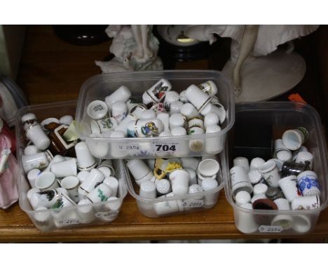 A COLLECTION OF CERAMIC THIMBLES, mostly souvenir, commemorative themed, etc.