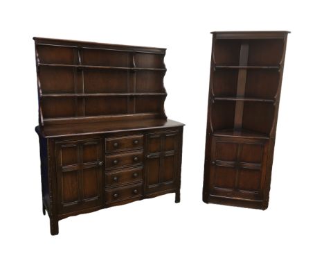 An Ercol dark stained dresser, 146 by 50 by 170cm high, together with an Ercol dark stained corner display cabinet, 76 by 40 