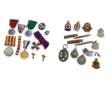 A collection of military and other medals and badges, belonging to members of the Sankey family: R. H. Sankey, J. O. Sankey a