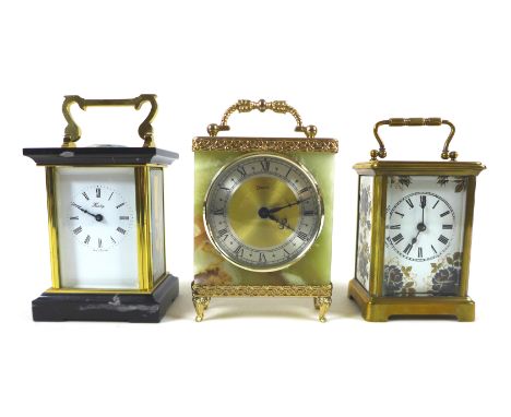 A mid 20th century brass cased carriage clock, the white enamel dial decorated with painted flowers, black Roman numerals, bl