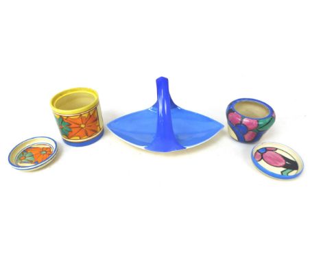 A mixed group of Clarice Cliff, comprising a blue handled bon-bon dish, shape 471, 21 by 13 by 12cm high, an 'Umbrellas' drum