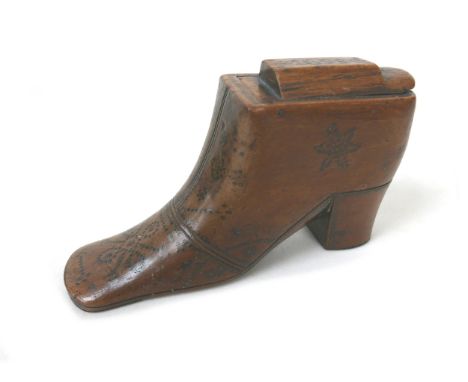A 17th century or later mahogany shoe snuff box, with brass stud decoration, bearing date '1699' and initials 'R.H.H.S', 14.5
