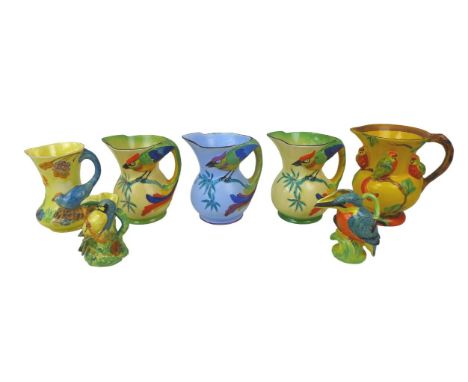 A collection of Art Deco jugs depicting birds, including Burleigh Ware Kingfisher, 12cm high, and Blue Tit, 11.5cm high, Wade