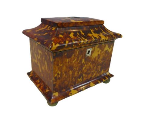 A George III tortoiseshell twin division tea caddy. 