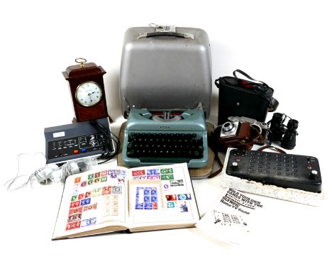 A group of mixed collectables, including an Imperial Good Companion 4 typewriter, a Triumph stamp album containing GB and Wor