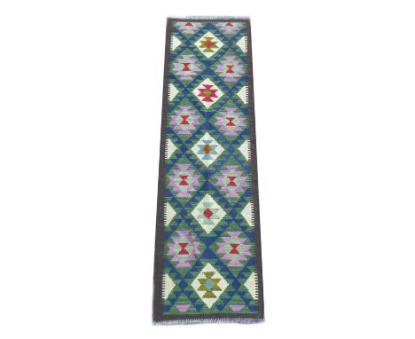 A Maimana Kilim runner, with diamond patterned of blue, purple, green, and cream, encased in a brown border, 206 by 63cm. 